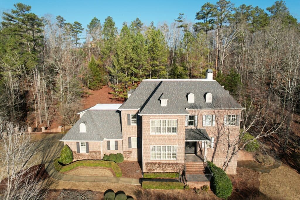 Noto Roofing crew working on a Birmingham area roof.