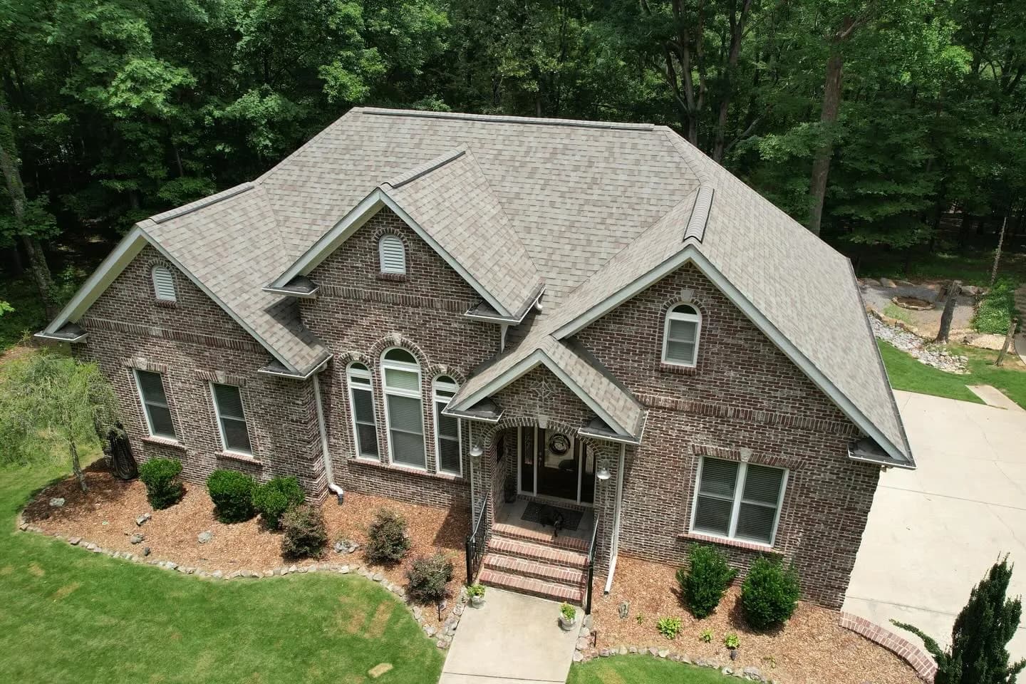 Noto Roofing crew working on a Birmingham area roof.